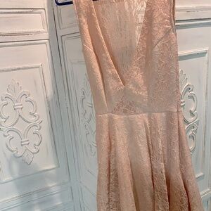 Adorable pink dress with see-through lace. Super feminine and elegant!
